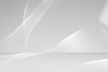 Abstract white studio room with light and shadow from window background for product display presentation