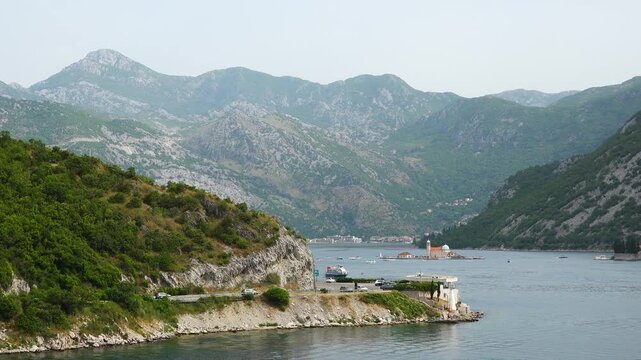 Set against the breathtaking backdrop of the mountains, this captivating experience highlights the enchanting islands located in Kotor Bay. Visitors can admire the unique architecture of the small str