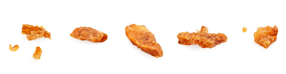 Collection of crispy fried onions isolated on white. Roasted Onion caramelized flakes set