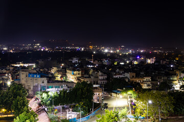 Fototapeta premium crowded city night light view from flat angle