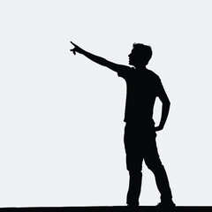Silhouette of a man pointing forward, creating a sense of direction and determination.