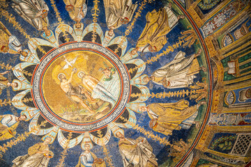 Beautiful mosaic in the dome ceiling of a church in Ravenna representing Saint John baptizing Jesus