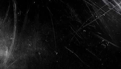 White scratches and dust on black background. Old dirty glass.
