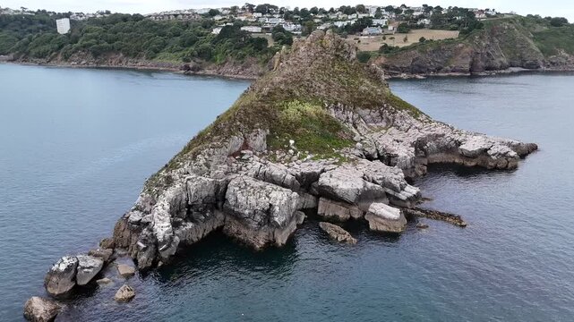 Thatcher Rock seen from clifftip footpath in Wellswood, Torquay, Devon, UK
