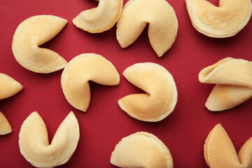 Traditional fortune cookies on red background
