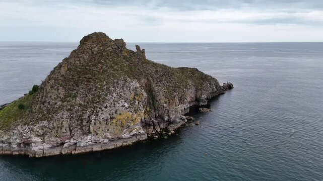 Thatcher Rock seen from clifftip footpath in Wellswood, Torquay, Devon, UK