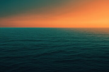 Fototapeta premium A gradient moving from a warm orange to a cool teal with a subtle grain effect, resembling a sunset over the ocean.