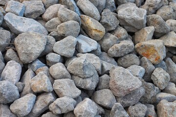 Piles of gravel limestone rock on construction site