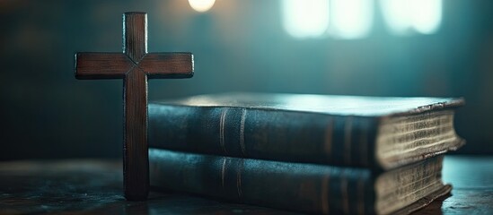Close up macro shot of a holy bible featuring a wooden crucifix cross with selective focus. with copy space image. Place for adding text or design