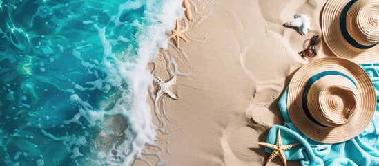Summer vacation concept flat lay Top view of beach accessories and towel Copyspace available Travel theme