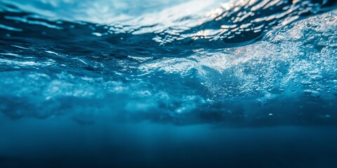 Obraz premium Dynamic swirling water currents captured underwater, showcasing the beauty and power of ocean movement.