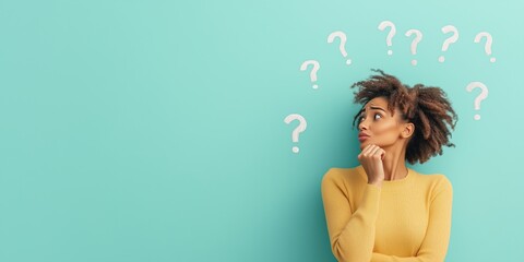 Woman in indecision, surrounded by question mark, on blue background with copy space. Brainstorming and decision making, searching for answers.