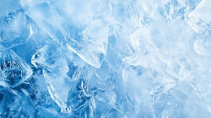 Closeup of an ice surface with intricate patterns and textures. Light blue background backdrop