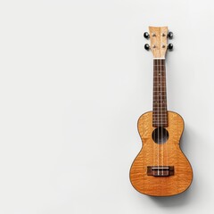 Obraz premium Ukulele on White Background: A classic wooden ukulele rests against a pristine white backdrop, its intricate details and warm tone inviting a musical journey. 