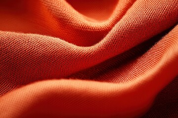 Close-up of soft orange fabric displaying texture and flow, perfect for fashion, design, and textile projects. - Powered by Adobe