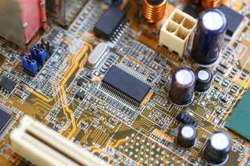 Black microchip socket on mainboard background.
