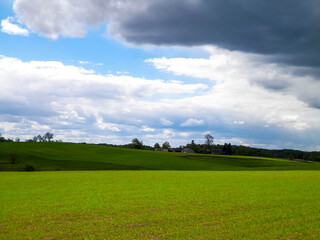 Green fields in Kashubia region - Northern Poland.
