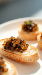 Close-up of a toasted baguette with caviar