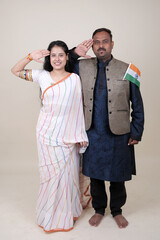 Playful couple wrapped in an Indian flag, celebrating their vibrant heritage with joy and affection. Perfect for showcasing cultural pride, unity, and festive spirit.