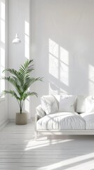 A spacious living room featuring a white sofa and potted palm basking in natural sunlight