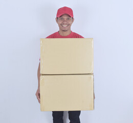 Delivery concept. Delivery man holding boxes on white background.