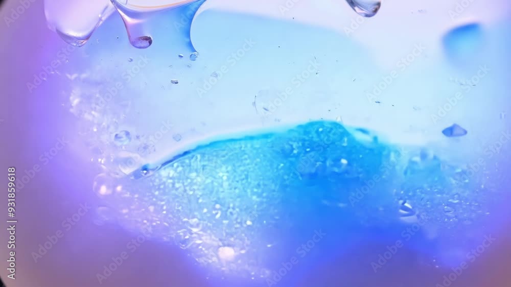 Poster single drop of liquid falls from a pipette, creating a delicate bubble on a blue surface, capturing 