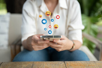 Social Distancing ,Working From Home concept.The concept of living on vacation and playing social media. Social media and digital online concept, man using smart phone with Social media.