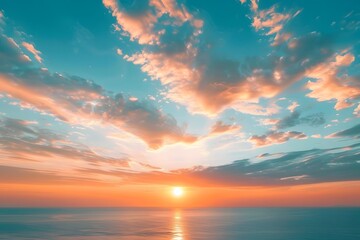 Obraz premium Breathtaking Sunset Over Tranquil Ocean Waters