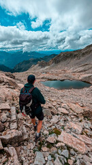 Exploring the valleys of the Eriste Peak: A man enjoys a day of mountaineering in the Aragonese Pyrenees, Huesca, fusing effort, sport and nature in a single trip.