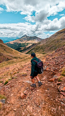 Adventurer in the Pyrenees: Traverse Argualas Peak and Algas Peak, contemplating the majestic landscape of the Ib&oacute;n de Pondiellos and the Infiernos and Arnales peaks in Panticosa, Tena Valley.