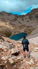  Ascending the imposing valleys of Pico Eriste, a mountaineer enjoys a day of sport in the...
