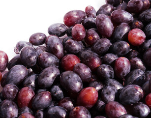 Grapes after washing on a white background. Clean cores of ripe grapes.