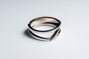 Elegant silver ring showcasing a modern design with a unique twist, perfect for adding sophistication to any outfit.