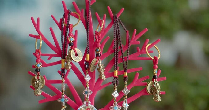 Various styles of keychains Sold inside the temple.