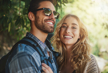 Obraz premium Couple, outdoor and happy with hike in forest to explore nature with bonding and care in Thailand. People, relationship and smile in woods on trip or journey for holiday, travel and adventure