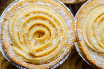 Fototapeta premium A pastry with a swirl of frosting on top