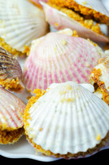 A plate of food with shells on it