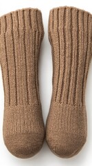 A close-up view of a woman's legs wearing soft socks against a pristine white background, highlighting comfort and warmth