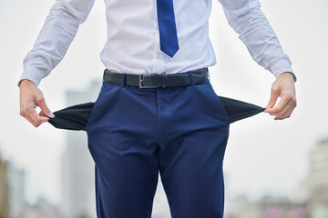 Nothing, pockets and hand of person, business and gambler in debt, financial crisis and...