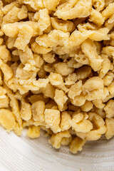 spaetzle egg pasta irregular shape fresh meal food snack on the table copy space food background rustic top view