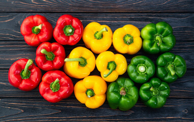 Fresh sweet bell pepper ( paprika ) photography red , green and yellow . Colorful vegetable . Top view