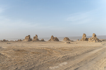 Moon landscape of limestone chimneys geological rock formations in a sunset rays at the bottom of...