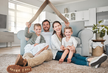 Happy family, portrait and roof with children for safety, security or property investment at home....