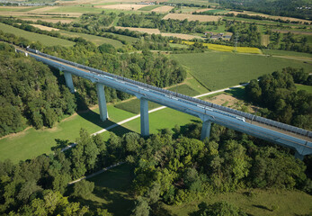 Obraz premium aerial view on a railroad viaduct in the course of the high speed express train route between Stuttgart and Mannheim, Baden Wuerttemberg Germany