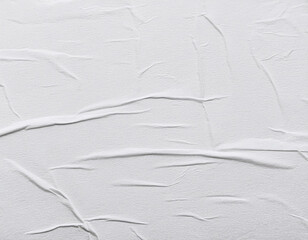 Obraz premium Blank white crumpled and creased paper poster texture background