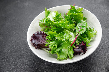 salad green leaves mix salad fresh meal food snack on the table copy space food background rustic top view keto or paleo diet vegetarian vegan food