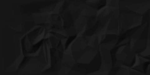 black wrinkly backdrop paper background. panorama grunge wrinkly paper texture. dark crumpled and top view textures can be used for background of text or any contents.	