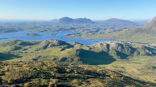Pan over Inverpolly to Suilven Cul Mor mountains Highlands Scotland