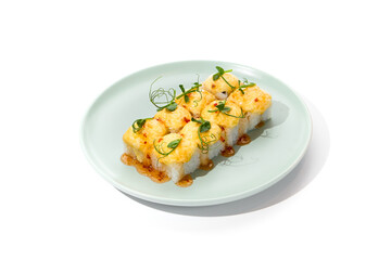 Baked Cheese-topped Sushi Roll with Sweet Chili Sauce on White Plate