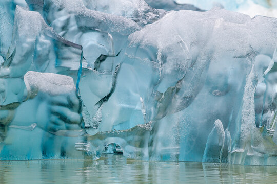 Glacial iceberg detail from ice calved off the South Sawyer Glacier in Tracy Arm, Southeast Alaska, Pacific Ocean, United States of America
